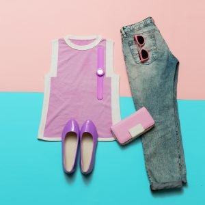 Fashionable Summer Look. Pink clothes and accessories. Jeans. Ca