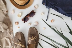 Male hipster fashion accessories on white. Flat lay, vacation and travel items