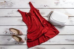 Red dress and heel shoes.