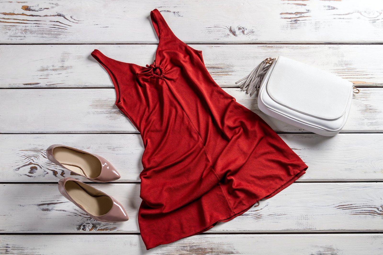 Red dress and heel shoes.