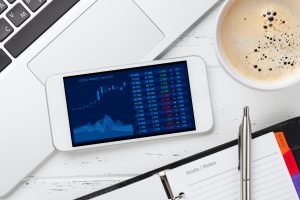 Smartphone on office workplace table