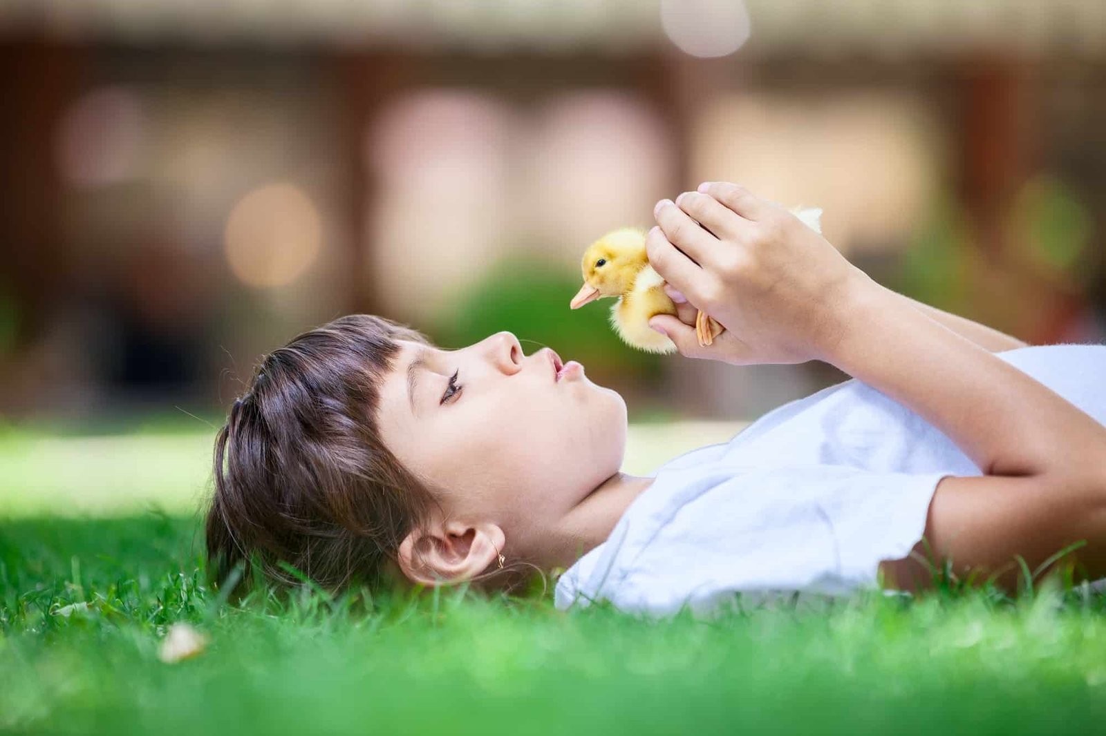 Girl with a spring duckling