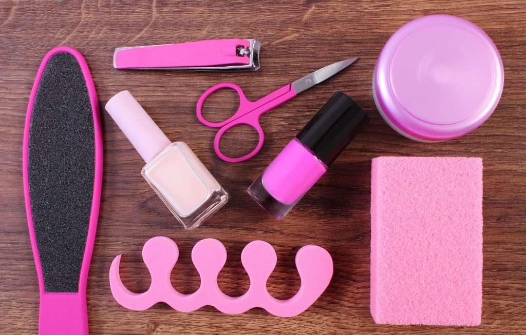 Cosmetics and accessories for manicure or pedicure, concept of foot, hand and nail care
