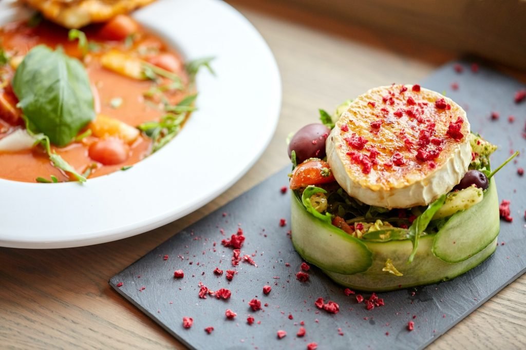 goat cheese salad and gazpacho soup at restaurant
