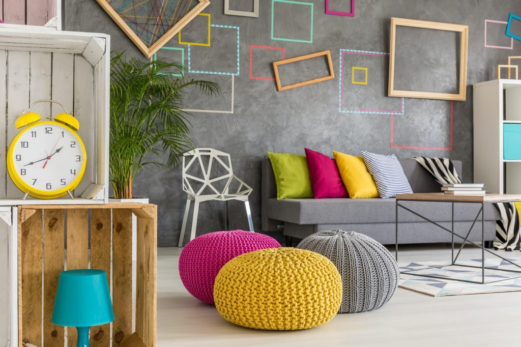 Hipster room with colorful poufs