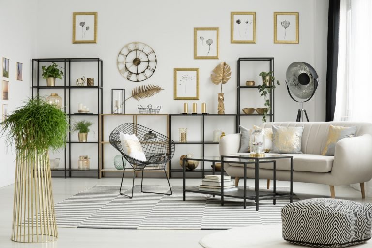 Spacious gold living room interior