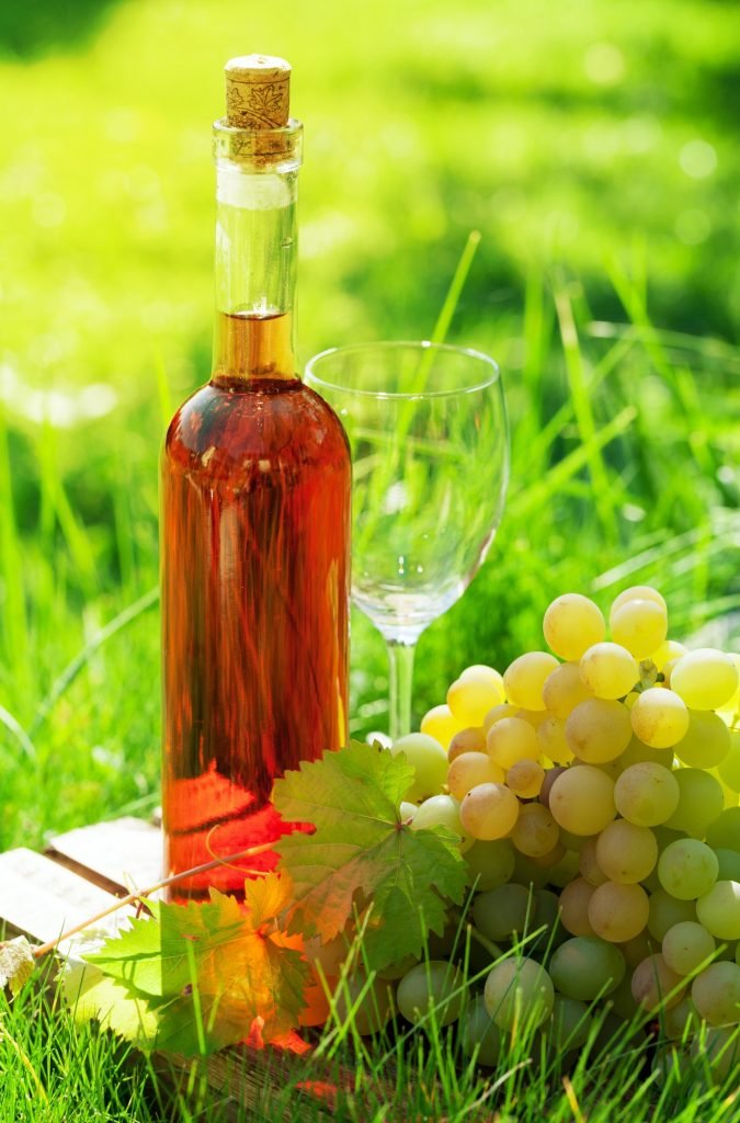 Rose wine and grapes