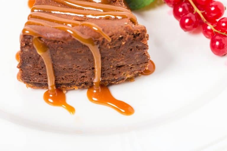 Delicious caramel cake with red currant.