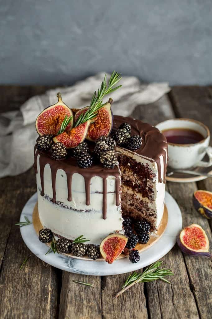 Delicious chocolate cake with figs and blackberries