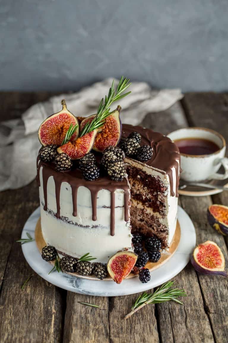 Delicious chocolate cake with figs and blackberries