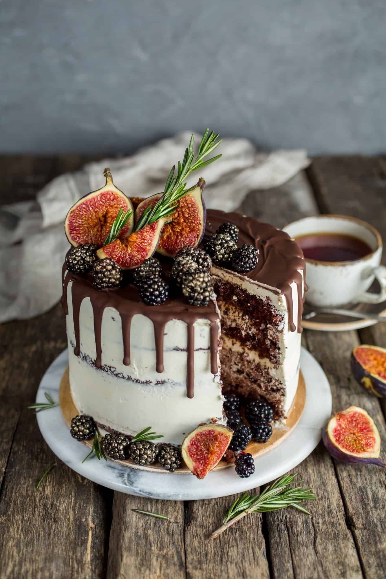 Delicious chocolate cake with figs and blackberries