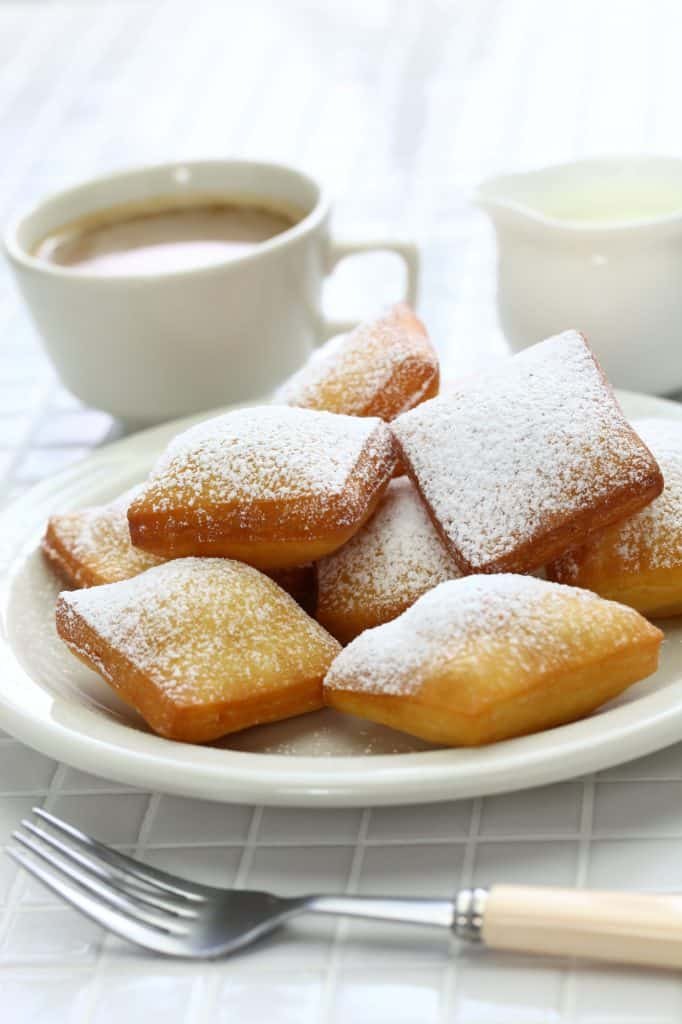homemade new orleans beignet and a cup of coffee