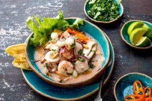 PERUVIAN CEVICHE SEBICHE. Peruvian seafood and fish ceviche with maize.