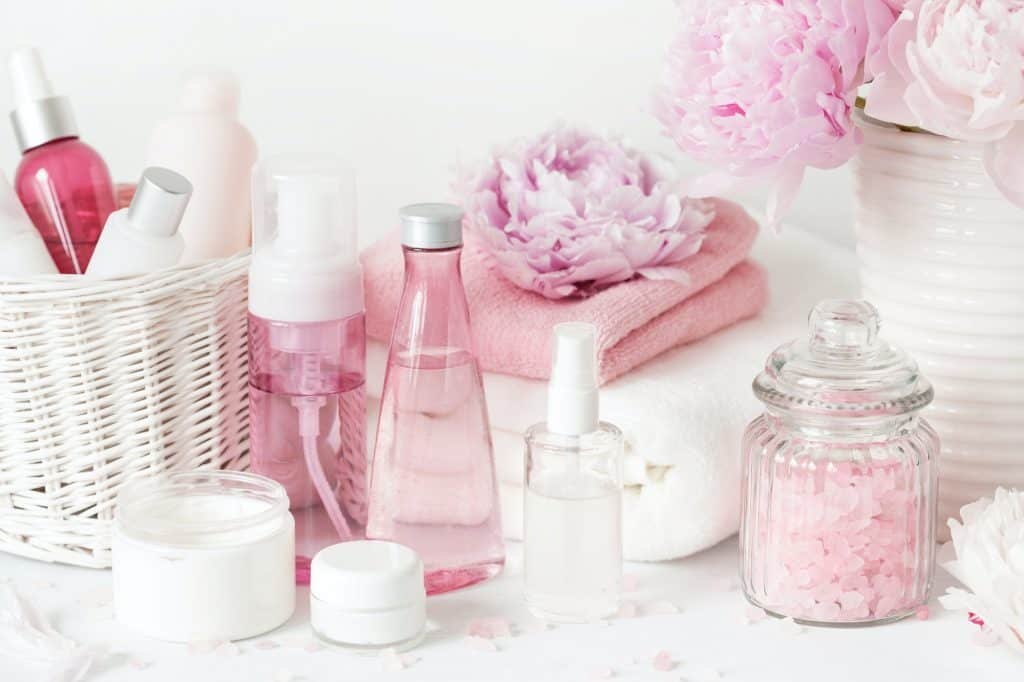 bath and spa with peony flowers beauty products towels