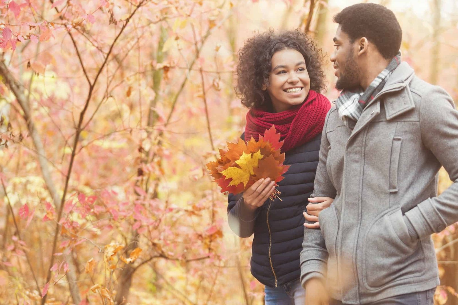 Love and relationship concept. Happy couple walking in park