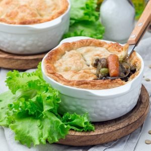 Vegetarian pot pie with lentil, mushroom, potato, carrot and gre