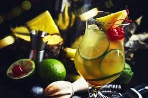 Summer exotic punch cocktail with pineapple juice