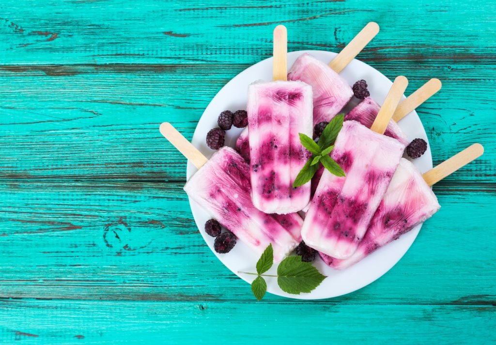 Yogurt popsicles with fresh black raspberry