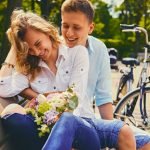 A couple on a dating in a summer park.