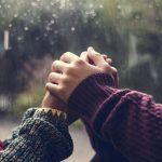 Happy couple holding hands