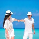 Young happy couple during beach tropical vacation