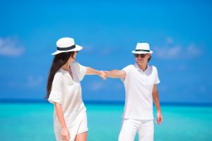 Young happy couple during beach tropical vacation