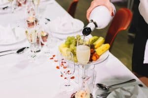 Pouring a toast of champagne on a wedding celebration party