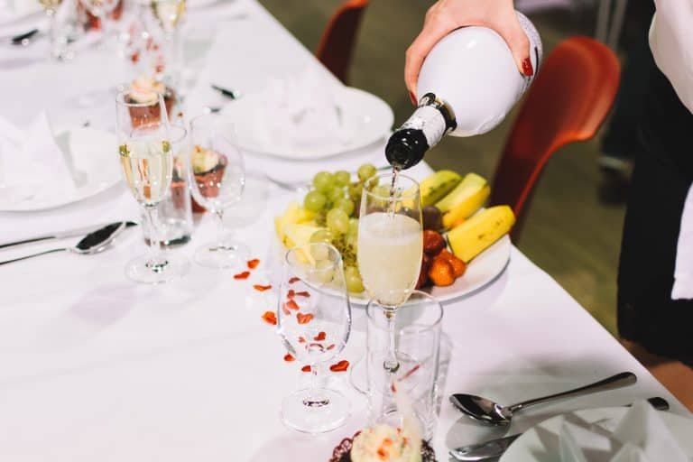 Pouring a toast of champagne on a wedding celebration party