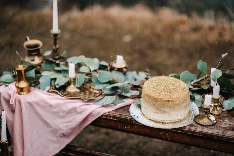 wedding decor with a golden cake